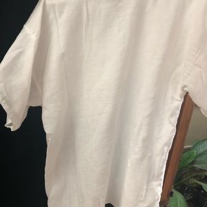 A man’s white linen